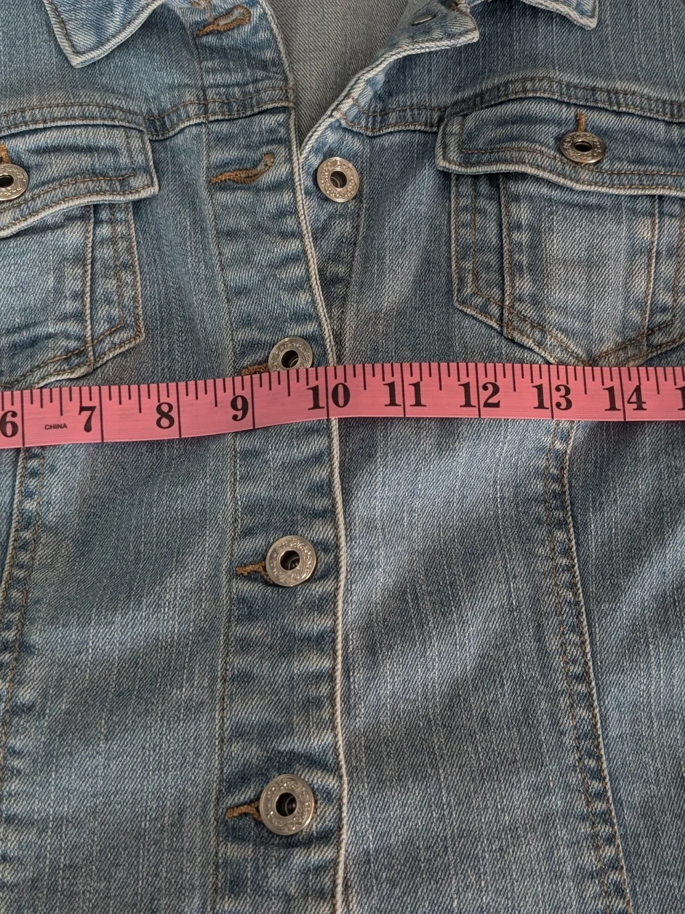 Light Wash Denim Ruffle Hem Jacket - Women